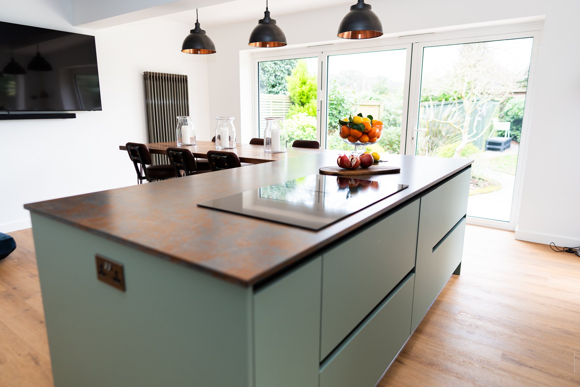 Green and Copper Kitchen with dramatic worktops in Bournemouth | Raison Home - 1